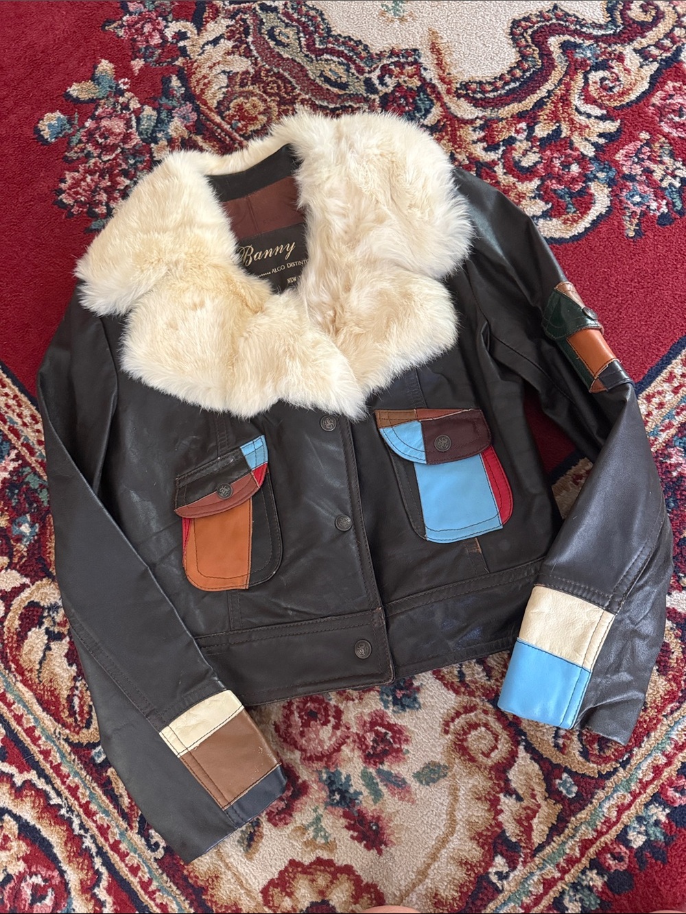Banny Black Leather Bomber Jacket with Cream Fur Collar and Color-Block Pockets